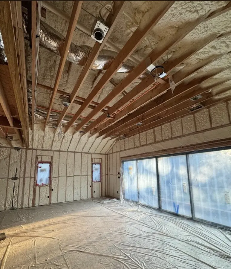 Interior walls and ceiling insulated with spray foam during new construction in Lahaina
